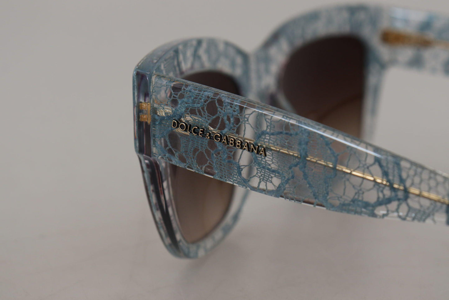 Lunettes de soleil bleues élégantes à détails en dentelle Dolce & Gabbana