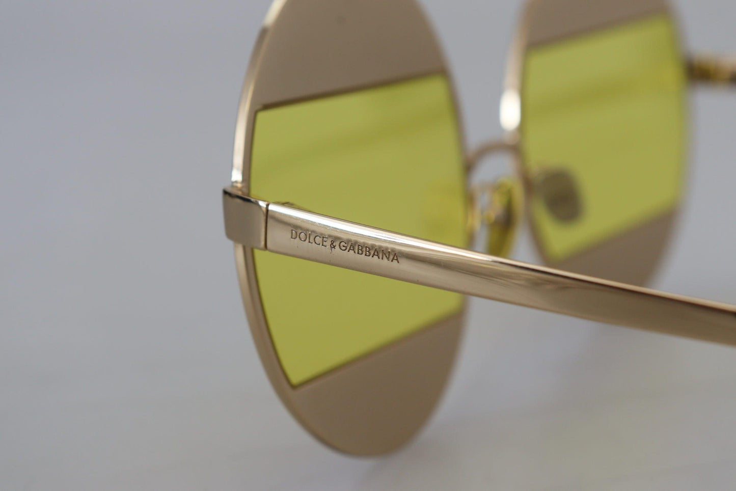 Lunettes de soleil ovales dorées ornées de cristaux Dolce & Gabbana